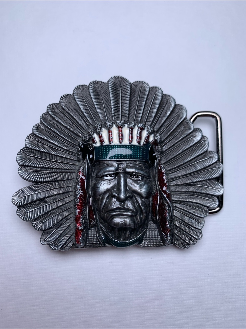 Belt buckle native man